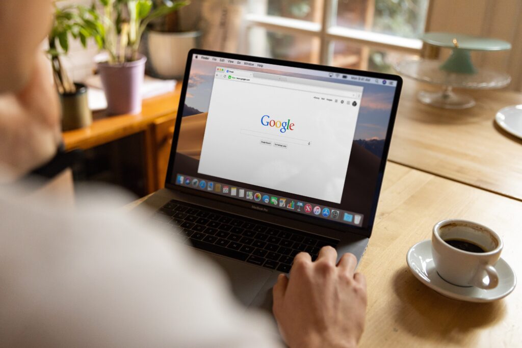 Laptop screen showing someone using Google to find a product